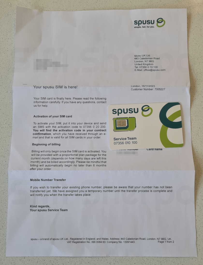 An unfolded letter from spusu with their SIM card inside